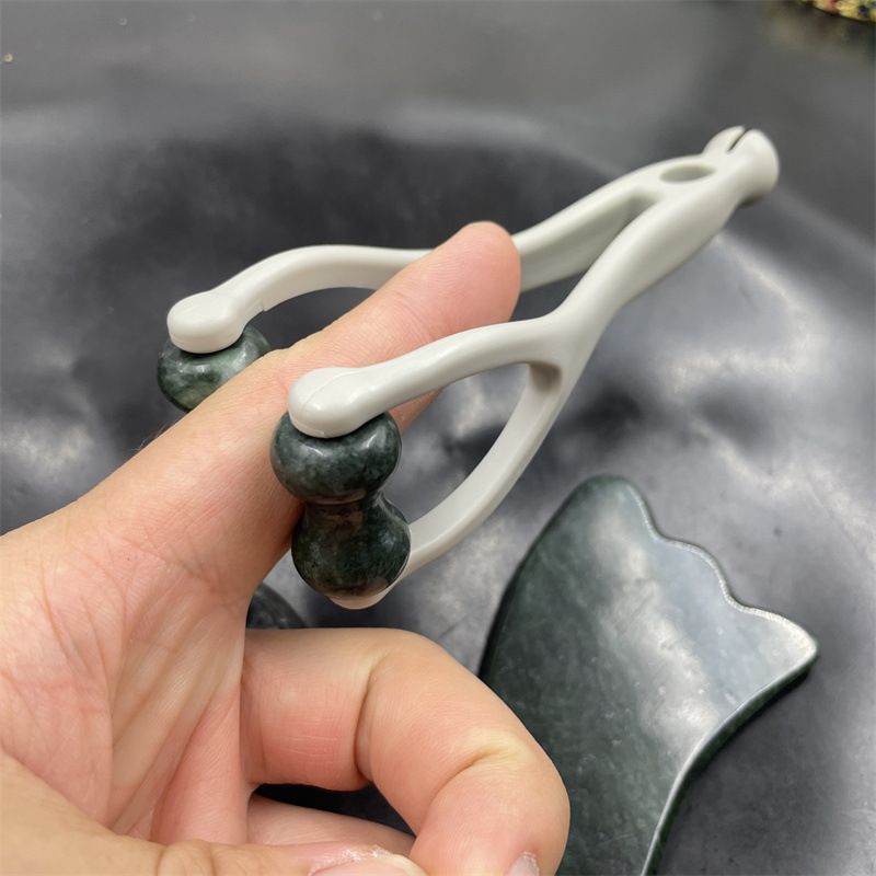 Naturstein-Massageset: Schabbrett, Fingerclip und eiförmiges Massagegerät